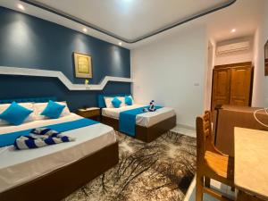 Postel nebo postele na pokoji v ubytování Seaview Hotel Dahab