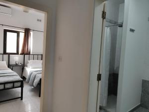 Tempat tidur dalam kamar di Le 3 isole