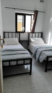 Postel nebo postele na pokoji v ubytování Le 3 isole