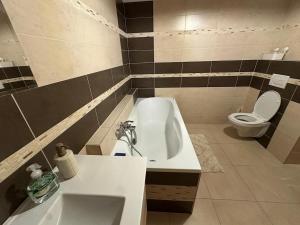 Koupelna v ubytování Moderný 3i byt s balkónom
