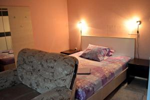 Ένα ή περισσότερα κρεβάτια σε δωμάτιο στο Apartments Bućin