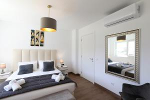Ένα ή περισσότερα κρεβάτια σε δωμάτιο στο Pearl - Apartment in a Luxury condominium