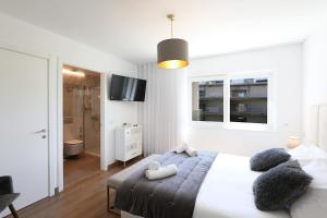 Ένα ή περισσότερα κρεβάτια σε δωμάτιο στο Pearl - Apartment in a Luxury condominium +22 φωτογραφίες