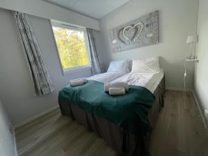 Postel nebo postele na pokoji v ubytování Fossanåsen Hotel