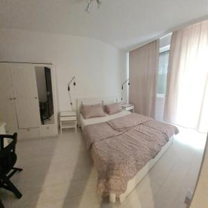 A bed or beds in a room at Come.in