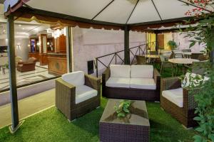 Posezení v ubytování Hotel Santa Costanza by OMNIA hotels