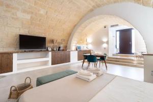 Un televizor și/sau centru de divertisment la Pasithéa - Casa della serenità