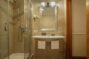 Koupelna v ubytování Hotel Santa Costanza by OMNIA hotels