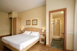 Koupelna v ubytování Hotel Santa Costanza by OMNIA hotels