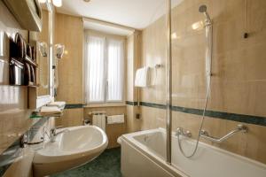 Koupelna v ubytování Hotel Santa Costanza by OMNIA hotels