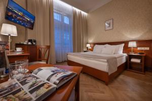 Postel nebo postele na pokoji v ubytování Hotel Rott