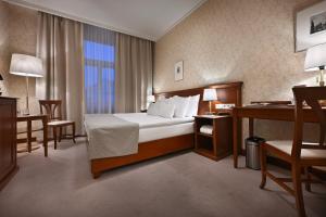 Postel nebo postele na pokoji v ubytování Hotel Rott