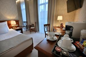 Postel nebo postele na pokoji v ubytování Hotel Rott