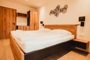 Postel nebo postele na pokoji v ubytování Hotel U Racka