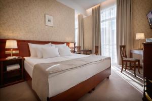 Postel nebo postele na pokoji v ubytování Hotel Rott