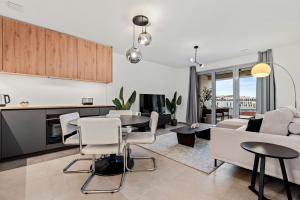 A seating area at Luxurious 1-BR Apt in Gasperich, Luxembourg