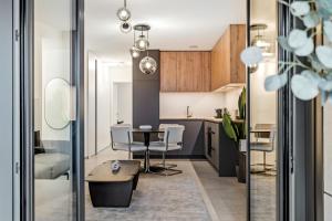 A seating area at Luxurious 1-BR Apt in Gasperich, Luxembourg