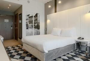 Posteľ alebo postele v izbe v ubytovaní Qubus Hotel Bydgoszcz