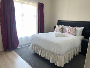 Ένα ή περισσότερα κρεβάτια σε δωμάτιο στο Luxury Edenberg apartment in Rivonia, Sandton