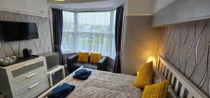 Katil atau katil-katil dalam bilik di The Roslyn Guest House