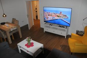 Televisyen dan/atau pusat hiburan di Apartment in Sendenhorst +1 gambar