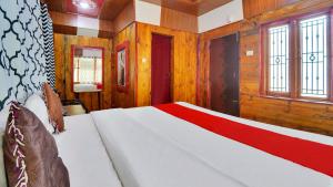 Postel nebo postele na pokoji v ubytování Coolspot Cottage