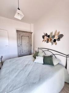 Postel nebo postele na pokoji v ubytování Le Mimose Terrace