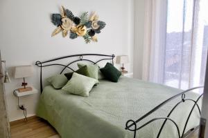 Postel nebo postele na pokoji v ubytování Le Mimose Terrace
