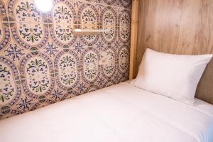 Postel nebo postele na pokoji v ubytování Smile Hostel