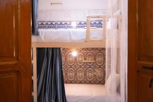 Postel nebo postele na pokoji v ubytování Smile Hostel