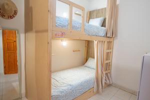 Postel nebo postele na pokoji v ubytování Smile Hostel