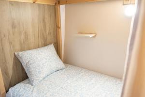 Postel nebo postele na pokoji v ubytování Smile Hostel