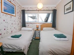 Postel nebo postele na pokoji v ubytování 18D South Snowdon Wharf