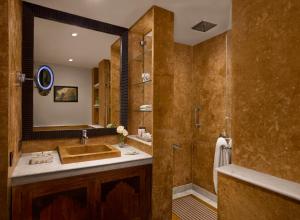 a large bathroom with a sink and a shower at Storii By ITC Hotels, Jaisalmer in Jaisalmer