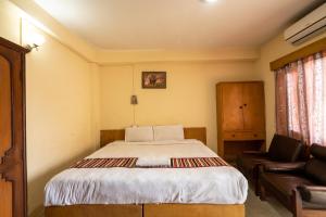 Uma cama ou camas num quarto em Hotel Nana