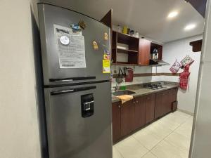 Η κουζίνα ή μικρή κουζίνα στο Apartamento Familiar Amoblado