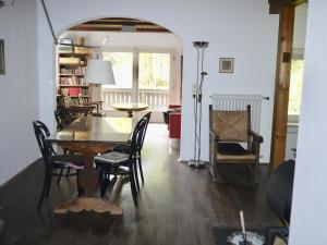 a dining room with a table and chairs at Großzügige Familienunterkunft in absoluter Idylle in Kiefersfelden +38 photos