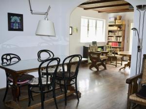 a dining room with a table and chairs at Großzügige Familienunterkunft in absoluter Idylle in Kiefersfelden
