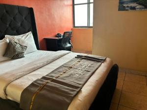 Katil atau katil-katil dalam bilik di Aotel Hotels & Suite - Ipaja