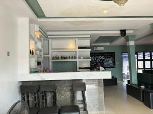Lounge atau bar di Aotel Hotels & Suite - Ipaja