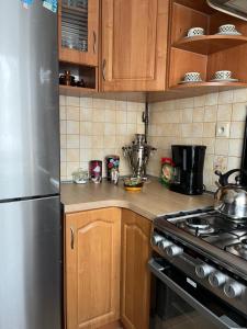 Kuchyň nebo kuchyňský kout v ubytování Apartament przy Parku Czartoryskich II - Faktury VAT - parking