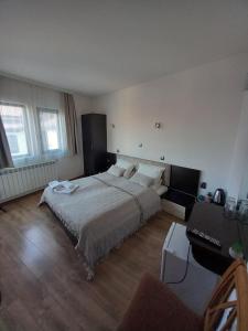 Postel nebo postele na pokoji v ubytování Guest house Skabrin