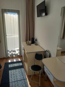 TV a/nebo společenská místnost v ubytování Guest house Skabrin