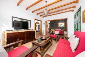 Telewizja i/lub zestaw kina domowego w obiekcie Villa Sol Y Mar
