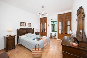 Łóżko lub łóżka w pokoju w obiekcie Villa Sol Y Mar