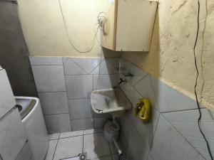 Vannituba majutusasutuses Ouropreto3quarto103