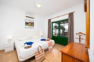 Postel nebo postele na pokoji v ubytování Villa Costa Papagayo 6 + 27 fotografií