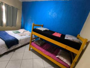 Voodi või voodid majutusasutuse Ouropreto3quarto103 toas