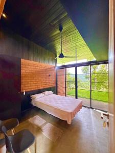 Katil atau katil-katil dalam bilik di Singhe Villa Banagala