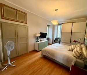 Ένα ή περισσότερα κρεβάτια σε δωμάτιο στο Casa Mia